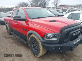 2017 Ram 1500 Rebel z VIN 1C6RR7YT3HS572725, wystawiony jako IAAI lot #41753982 z przebiegiem 154 540 mil mil oraz . Historia ofert i sprzedaży dostępna na DreamBid. Obrazek 1.
