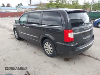 2014 Chrysler Town & Country Touring with VIN 2C4RC1BG4ER469409, listed as a IAAI auction lot 41919315 with 135,894 mi miles. Bid and sale history available at carsss.com. Image 3.