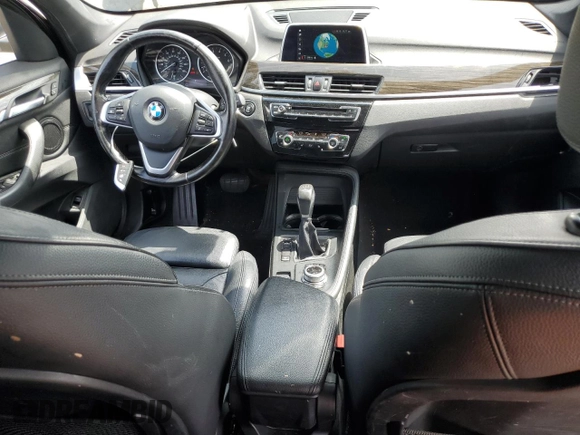 2018 BMW X1 xDrive28i with VIN WBXHT3C36J5F89230, listed as a Copart auction lot 62904545 with 170,860 mi miles and Salvage title. Bid and sale history available at DreamBid. Image 8.