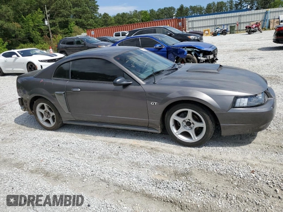 2003 Ford Mustang GT Deluxe with VIN 1FAFP42X13F392646, listed as a Copart auction lot 57938995 with 117,732 mi miles and Salvage title. Bid and sale history available at DreamBid. Image 4.