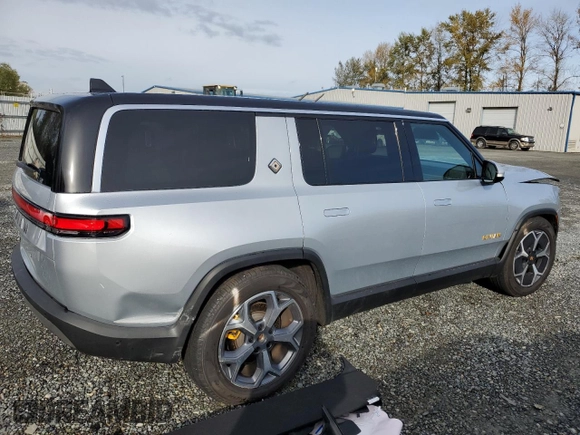 2023 Rivian R1S Adventure z VIN 7PDSGABAXPN019516, wystawiony jako Copart lot #73248104 z przebiegiem 11 525 mil mil oraz Szkody całkowita. Historia ofert i sprzedaży dostępna na DreamBid. Obrazek 3.