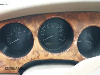 1997 Jaguar XK with VIN SAJGX2745VC017589, listed as a IAAI auction lot 42208129 with Not Provided miles and . Bid and sale history available at DreamBid. Image 7.