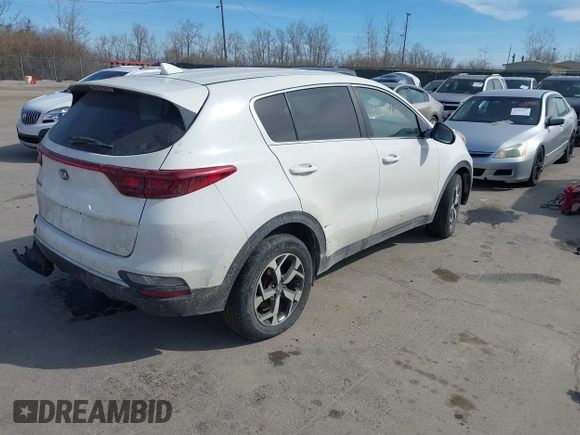 2020 Kia Sportage LX with VIN KNDPMCAC2L7776669, listed as a IAAI auction lot 41810620 with 186,599 mi miles and . Bid and sale history available at carsss.com. Image 4.