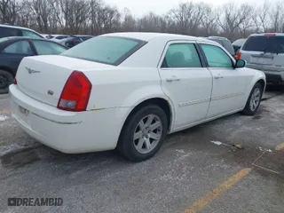 2006 Chrysler 300 Touring with VIN 2C3KA53G36H525834, listed as a IAAI auction lot 41274514 with 147,302 mi miles. Bid and sale history available at carsss.com. Image 4.