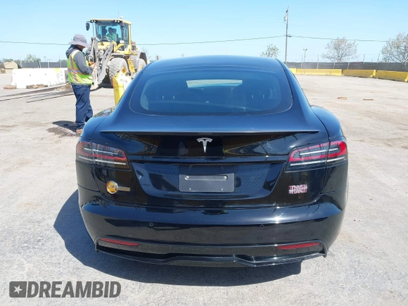 2022 Tesla Model S Plaid with VIN 5YJSA1E61NF483354, listed as a IAAI auction lot 41973636 with 32,541 mi miles and . Bid and sale history available at DreamBid. Image 16.