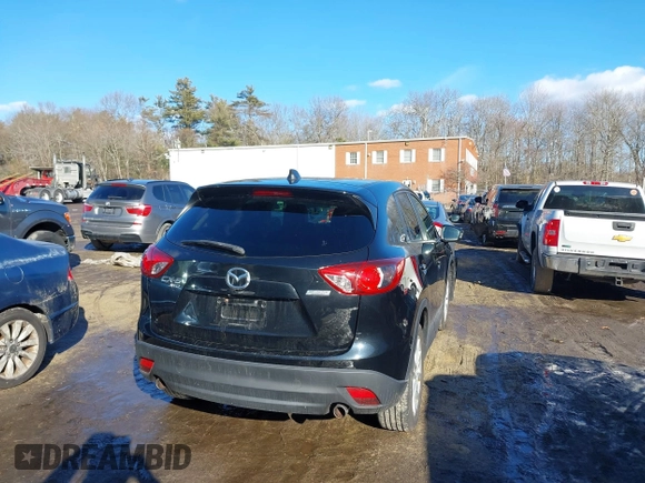 2014 Mazda CX-5 Grand Touring with VIN JM3KE4DY1E0303658, listed as a IAAI auction lot 41536769 with 158,777 mi miles. Bid and sale history available at carsss.com. Image 15.