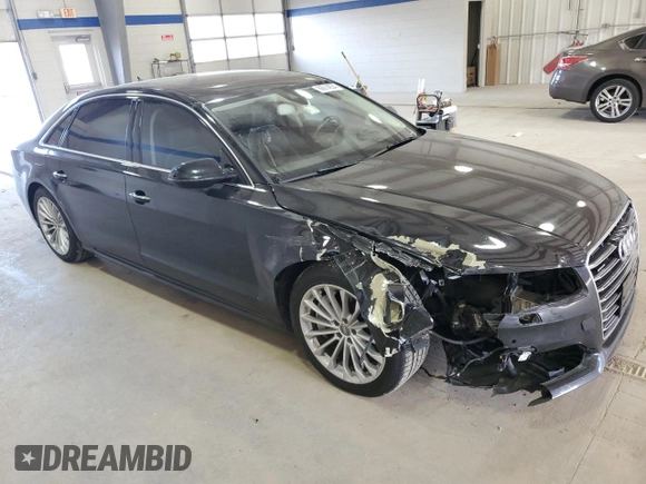 2016 Audi A8 Sport z VIN WAU43AFD1GN011589, wystawiony jako Copart lot #86614934 z przebiegiem 96 137 mil mil oraz Szkoda całkowita • Salvage title. Historia ofert i sprzedaży dostępna na DreamBid. Obrazek 4.