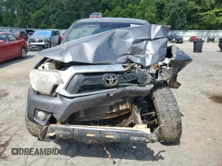 2014 Toyota Tacoma with VIN 5TFMU4FN3EX025697, listed as a Copart auction lot 62146895 with 133,028 mi miles and Salvage title. Bid and sale history available at DreamBid. Image 5.