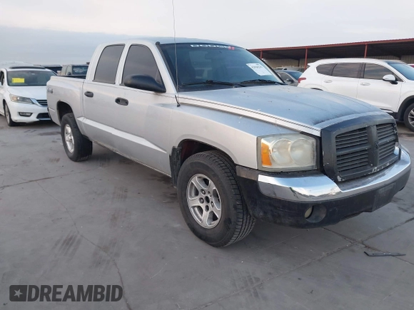 2005 Dodge Dakota SLT with VIN 1D7HW48N35S310086, listed as a IAAI auction lot 42020235 with 267,357 mi miles and . Bid and sale history available at DreamBid. Image 1.