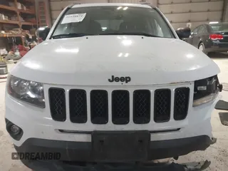 2012 Jeep Compass Latitude with VIN 1C4NJDEB0CD676725, listed as a IAAI auction lot 41948874 with 143,833 mi miles. Bid and sale history available at carsss.com. Image 12.