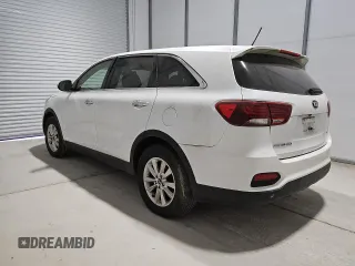 2019 Kia Sorento LX z VIN 5XYPG4A54KG482528, wystawiony jako Copart lot #55098735 z przebiegiem 128 821 mil mil oraz Czysty tytuł • Clean title. Historia ofert i sprzedaży dostępna na DreamBid. Obrazek 2.