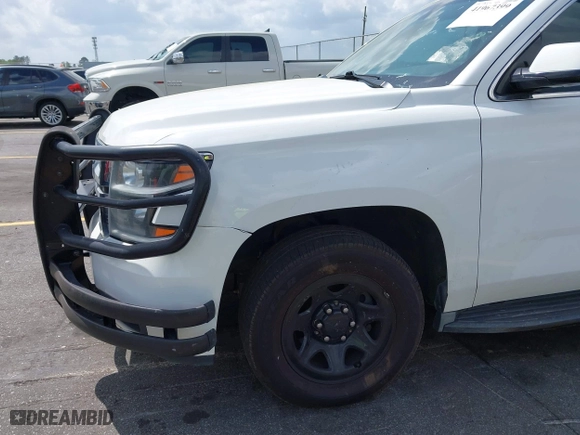 2016 Chevrolet Tahoe Commercial with VIN 1GNLCDEC5GR423300, listed as a IAAI auction lot 41967399 with 147,429 mi miles. Bid and sale history available at carsss.com. Image 17.