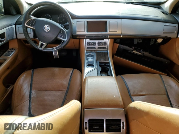 2012 Jaguar XF Portfolio with VIN SAJWA0HBXCLS24703, listed as a Copart auction lot 43380585 with 0 mi miles and Salvage Title. Bid and sale history available at carsss.com. Image 8.