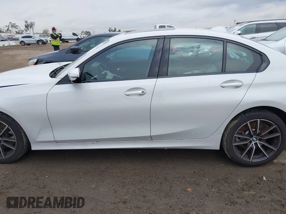 2022 BMW 3 Series 330i with VIN 3MW5R1J0XN8C67673, listed as a IAAI auction lot 41777963 with 21,812 mi miles and . Bid and sale history available at DreamBid. Image 14.