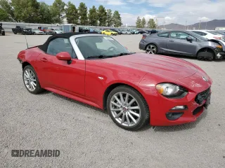 2017 FIAT 124 Spider Lusso z VIN JC1NFAEK5H0123760, wystawiony jako Copart lot #55865845 z przebiegiem 52 285 mil mil oraz Szkoda całkowita • Salvage title. Historia ofert i sprzedaży dostępna na DreamBid. Obrazek 4.