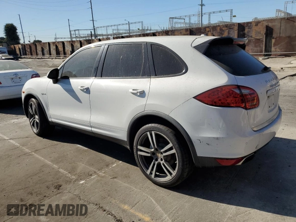 2012 Porsche Cayenne S Hybrid z VIN WP1AE2A23CLA93180, wystawiony jako Copart lot #88579675 z przebiegiem 50 909 mil mil oraz Tytuł czysty. Historia ofert i sprzedaży dostępna na DreamBid. Obrazek 2.