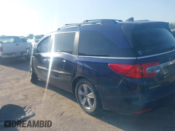 2019 Honda Odyssey EX-L with VIN 5FNRL6H75KB054465, listed as a IAAI auction lot 41841488 with 141,790 mi miles. Bid and sale history available at carsss.com. Image 3.