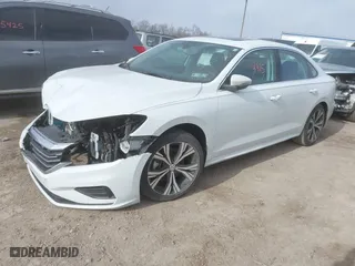 2021 Volkswagen Passat 2.0T SE with VIN 1VWSA7A35MC006675, listed as a IAAI auction lot 41634815 with 85,746 mi miles. Bid and sale history available at carsss.com. Image 2.
