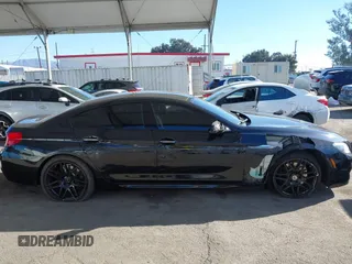 2015 BMW 6 Series 640i with VIN WBA6A0C52FGB53591, listed as a IAAI auction lot 41247695 with 81,828 mi miles and . Bid and sale history available at DreamBid. Image 13.