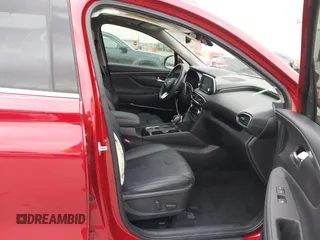 2019 Hyundai Santa Fe Limited with VIN 5NMS53AD2KH110435, listed as a IAAI auction lot 41712962 with 76,589 mi miles. Bid and sale history available at carsss.com. Image 5.