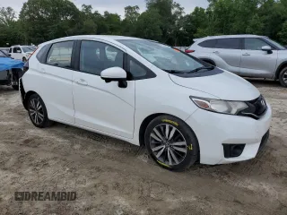 2016 Honda Fit EX with VIN JHMGK5H76GS004073, listed as a Copart auction lot 60194115 with 189,283 mi miles and Salvage title. Bid and sale history available at DreamBid. Image 4.