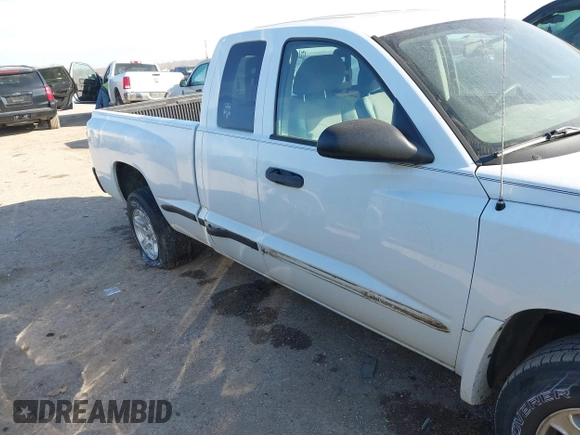 2005 Dodge Dakota SLT with VIN 1D7HE42KX5S251037, listed as a IAAI auction lot 41334761 with 202,865 mi miles and . Bid and sale history available at carsss.com. Image 6.
