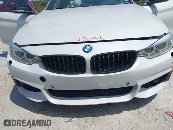 2015 BMW 4 Series 428i xDrive z VIN WBA3N5C58FK198825, wystawiony jako IAAI lot #41919172 z przebiegiem 125 421 mil mil oraz . Historia ofert i sprzedaży dostępna na DreamBid. Obrazek 6.