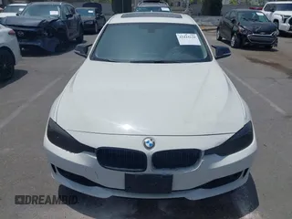 2014 BMW 3 Series 328i with VIN WBA3C1C52EK110753, listed as a IAAI auction lot 42444129 with 169,035 mi miles and . Bid and sale history available at DreamBid. Image 12.