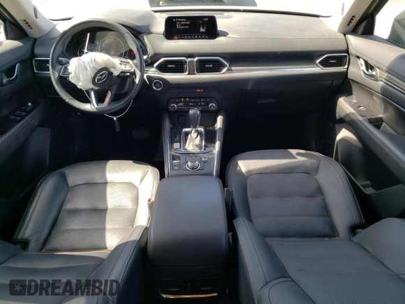 2019 Mazda CX-5 Grand Touring with VIN JM3KFADM6K1641992, listed as a Copart auction lot 57862345 with 37,100 mi miles and Salvage title. Bid and sale history available at DreamBid. Image 8.