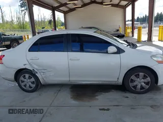 2008 Toyota Yaris with VIN JTDBT923081216819, listed as a IAAI auction lot 42153326 with 125,794 mi miles. Bid and sale history available at carsss.com. Image 13.