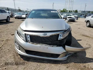 2015 Kia Optima EX с VIN 5XXGN4A71FG385837, выставлен на аукционе Copart как лот 60113905 с пробегом 172 274 миль миль и Списание • Salvage title. История ставок и продаж доступна на DreamBid. Изображение 5.