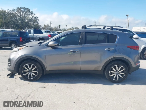 2017 Kia Sportage EX z VIN KNDPN3AC7H7233998, wystawiony jako IAAI lot #41588712 z przebiegiem 137 819 mil mil oraz . Historia ofert i sprzedaży dostępna na DreamBid. Obrazek 14.