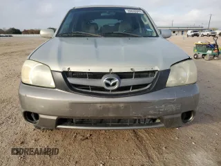 2005 Mazda Tribute i with VIN 4F2YZ02Z95KM44817, listed as a Copart auction lot 85033344 with 258,976 mi miles and Salvage Title. Bid and sale history available at carsss.com. Image 5.