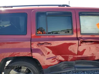 2014 Jeep Patriot High Altitude with VIN 1C4NJPFA0ED790184, listed as a Copart auction lot 49798305 with 196,188 mi miles and Salvage Title. Bid and sale history available at DreamBid. Image 11.
