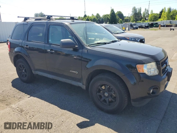 2010 Ford Escape Hybrid with VIN 1FMCU4K38AKC98072, listed as a Copart auction lot 58192375 with 123,958 mi miles and Salvage title. Bid and sale history available at DreamBid. Image 4.