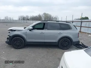 2024 Kia Telluride EX X-Line z VIN 5XYP3DGC2RG496309, wystawiony jako IAAI lot #41804549 z przebiegiem 16 785 mil mil oraz . Historia ofert i sprzedaży dostępna na DreamBid. Obrazek 15.