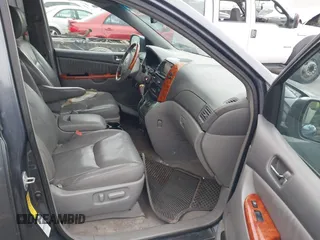 2009 Toyota Sienna XLE with VIN 5TDBK22C19S027059, listed as a IAAI auction lot 42105532 with 241,532 mi miles. Bid and sale history available at carsss.com. Image 5.