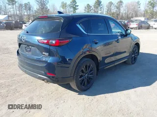 2022 Mazda CX-5 2.5 Turbo with VIN JM3KFBAY4N0534690, listed as a IAAI auction lot 41716988 with 23,910 mi miles and . Bid and sale history available at carsss.com. Image 4.