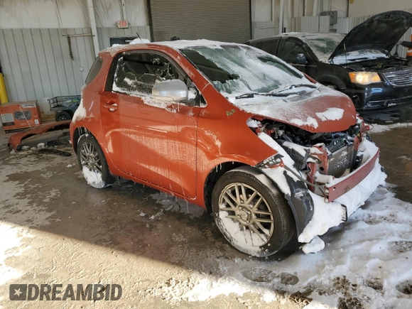 2015 Scion iQ with VIN JTNJJXB09FJ030667, listed as a Copart auction lot 87321594 with 124,895 mi miles and Salvage Title. Bid and sale history available at carsss.com. Image 4.