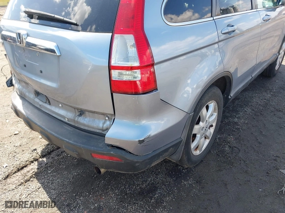 2009 Honda CR-V EX-L with VIN 5J6RE48799L065209, listed as a IAAI auction lot 41868398 with 111,385 mi miles. Bid and sale history available at carsss.com. Image 19.
