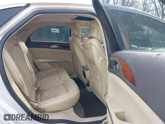 2013 Lincoln MKZ z VIN 3LN6L2G97DR823270, wystawiony jako IAAI lot #41746880 z przebiegiem 225 618 mil mil oraz . Historia ofert i sprzedaży dostępna na DreamBid. Obrazek 8.