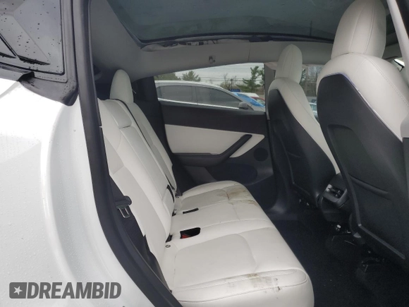 2020 Tesla Model Y Long Range with VIN 5YJYGDEE2LF019133, listed as a Copart auction lot 51773455 with 26,122 mi miles and Salvage Title. Bid and sale history available at DreamBid. Image 10.