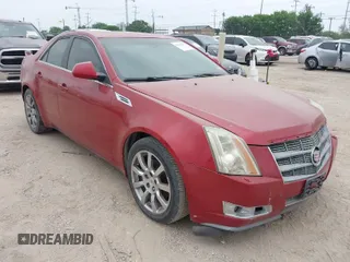 2009 Cadillac CTS RWD w/1SB with VIN 1G6DV57V390133952, listed as a IAAI auction lot 41948486 with 216,593 mi miles. Bid and sale history available at carsss.com. Image 1.