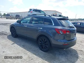 2014 Mazda CX-9 Grand Touring with VIN JM3TB2DA4E0436340, listed as a IAAI auction lot 42442249 with 102,856 mi miles and . Bid and sale history available at DreamBid. Image 3.