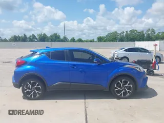 2018 Toyota C-HR XLE z VIN NMTKHMBX5JR057407, wystawiony jako IAAI lot #42363412 z przebiegiem 155 673 mil mil oraz . Historia ofert i sprzedaży dostępna na DreamBid. Obrazek 13.