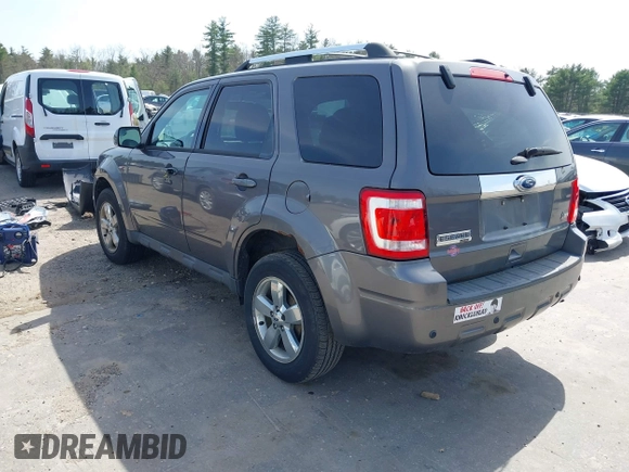 2011 Ford Escape Limited with VIN 1FMCU9EG6BKB01025, listed as a IAAI auction lot 42136708 with 210,349 mi miles. Bid and sale history available at carsss.com. Image 3.