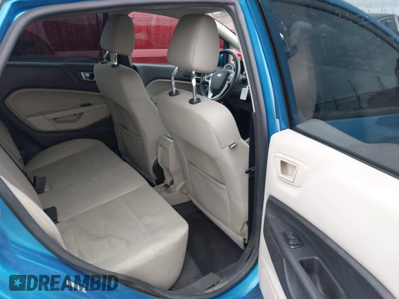 2016 Ford Fiesta SE with VIN 3FADP4BJXGM156859, listed as a IAAI auction lot 42119154 with 74,157 mi miles and . Bid and sale history available at DreamBid. Image 8.