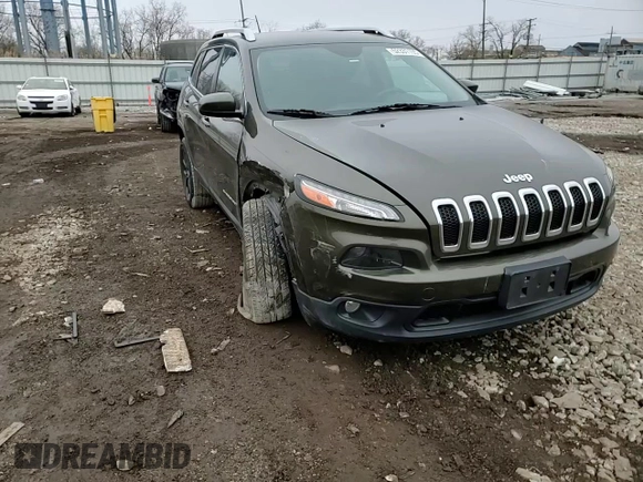 2015 Jeep Cherokee Latitude z VIN 1C4PJMCS7FW515406, wystawiony jako Copart lot #52331155 z przebiegiem 129 815 mil mil oraz Szkoda całkowita • Salvage title. Historia ofert i sprzedaży dostępna na DreamBid. Obrazek 11.