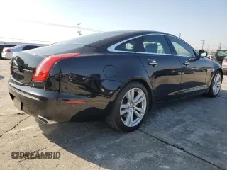 2011 Jaguar XJ with VIN SAJWA1CB4BLV05830, listed as a Copart auction lot 43007345 with 72,933 mi miles and Salvage title. Bid and sale history available at DreamBid. Image 3.
