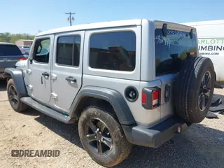 2023 Jeep Wrangler Sport z VIN 1C4HJXDG0PW582947, wystawiony jako IAAI lot #41932930 z przebiegiem 19 670 mil mil oraz . Historia ofert i sprzedaży dostępna na DreamBid. Obrazek 3.